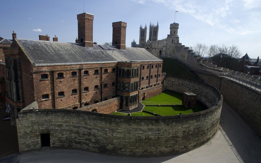 A Victorian-era prison is situated within the walls of Lincoln Castle. The curving prison wall encloses a former exercise yard for the prisoners.