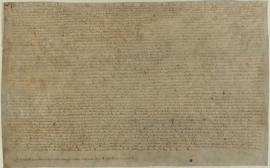 A copy of the 1215 Magna Carta held by the British Library. The Magna Carta, which means Great Charter, was signed in 1215 by King John of England under pressure from his nobles. The charter imposed certain obligations on the king, including prohibiting him from delaying or selling access to justice.