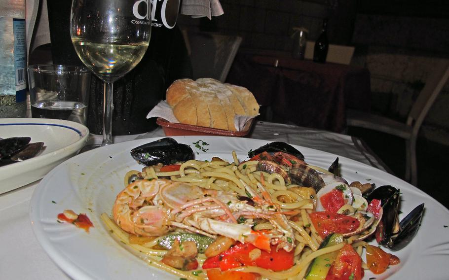 The seafood spaghetti looked better than it tasted at CalaMarè restaurant in Vicenza, Italy. The shellfish were sweet but the sauce was not.