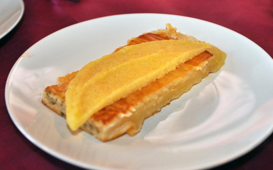 Not only is the "frico" homemade at Al Bronzetto, but the cheese that's in the signature dish of Friuli-Venezia Giulia is homemade, tool. And it's toped with grilled polenta.