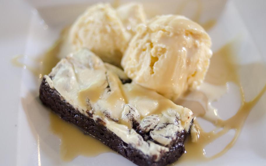 One of the desserts at the Cambridge, England, restaurant, The Architect, is a peanut butter brownie with ice cream.