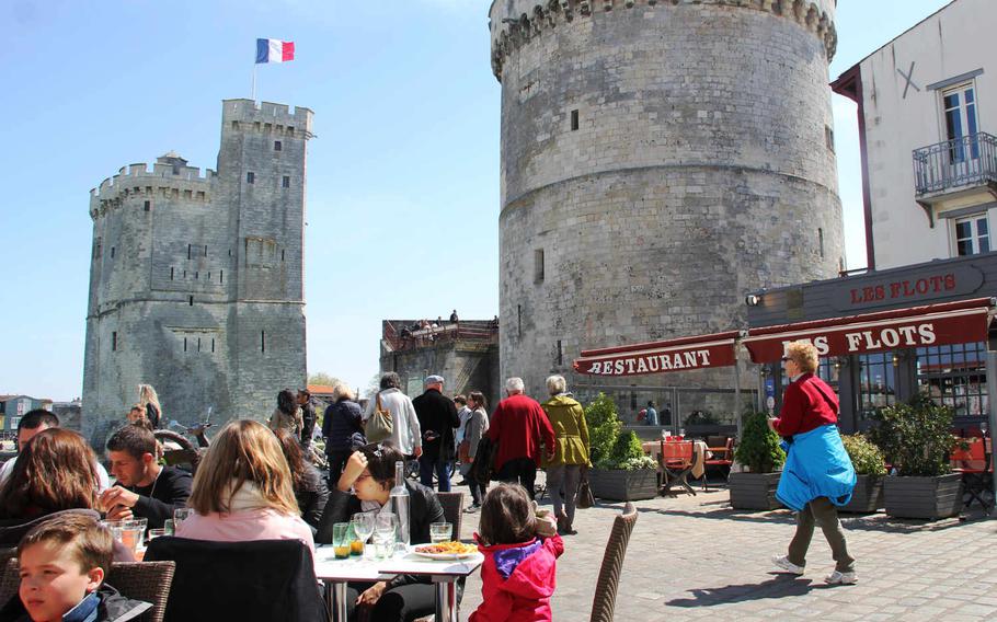 Two ancient towers guard the harbor entrance to La Rochelle, a coastal town. The scenic harbor is a popular spot for both tourists and locals, with numerous restaurants whose sidewalk tables are usually full.

Leah Larkin/Special to Stars and Stripes