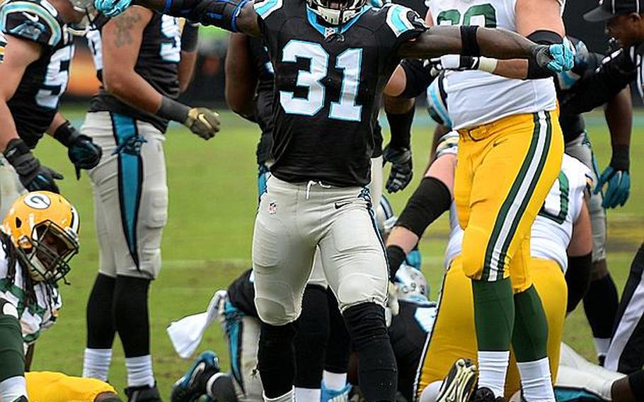 Carolina Panthers cornerback Charles Tillman celebrates a defensive stop during the second quarter against the Green Bay Packers on Nov. 8, 2015, at Bank of America Stadium in Charlotte, N.C. Tillman, who was an Army brat and attended 11 schools as his father moved from base to base in the U.S. and Germany, shares the lessons he learned while growing up in "The Middle School Rules of Charles Tillman," as told to Sean Jensen.