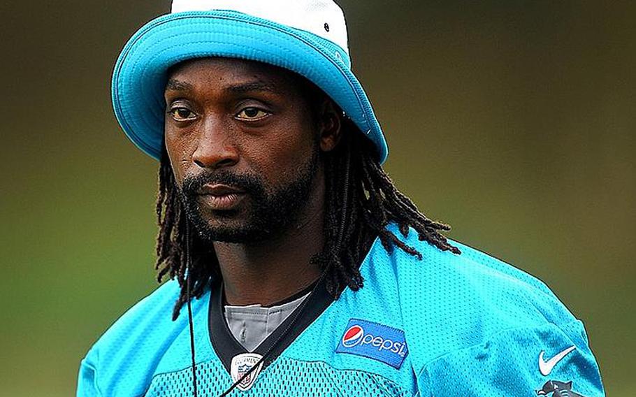 Carolina Panthers cornerback Charles Tillman walks to practice at Wofford College on Aug. 6 in Spartanburg, S.C. Tillman hopes kids can learn from his new book, "The Middle School Rules of Charles Tillman," as told by Sean Jensen.