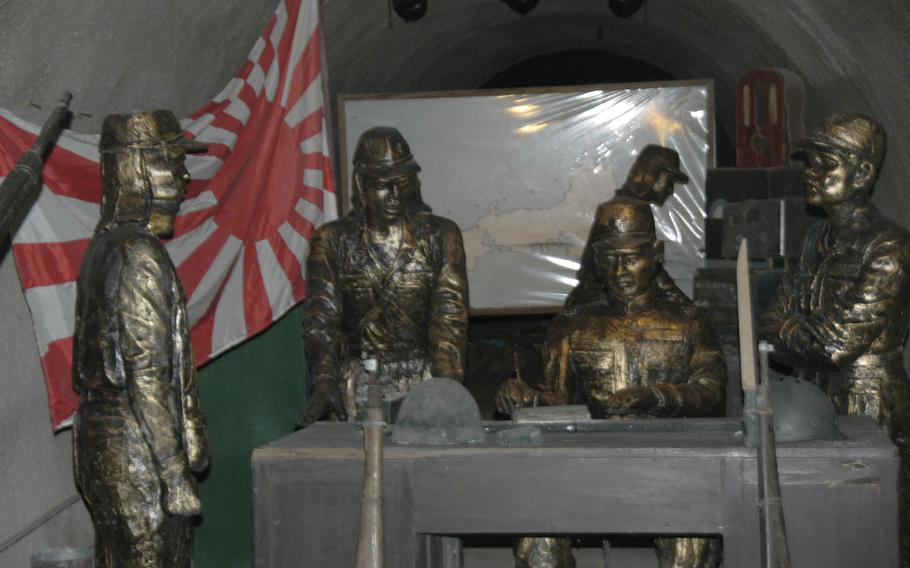 Mannequins depict World War II-era Japanese soldiers sheltering inside Malinta Tunnel on Corregidor Island in the Philippines.