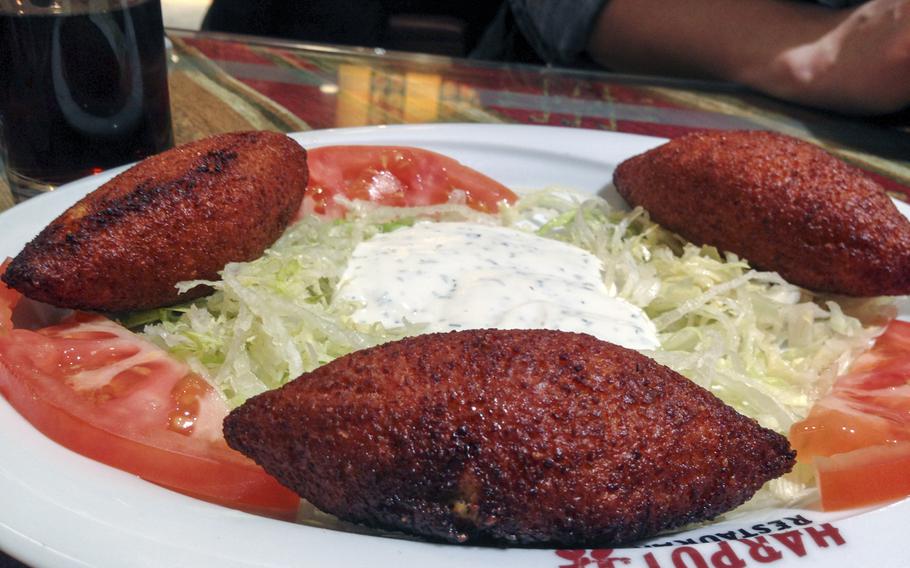 A plate of icli kofte, or fried coquette stuffed with minced beef and vegetables, at Harput Turkish restaurant in Wiesbaden, Germany. Harput features a wide range of traditional and modern Anatolian cuisine at reasonable prices.
