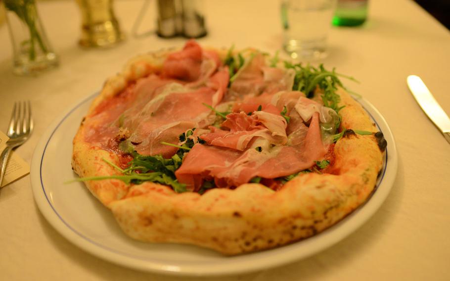 One of Pizzeria Brandi's signature pies, the Don Matilde, which combines tomatoes, cow's milk mozzarella, arugula, fresh prosciutto di Parma and basil. The Naples, Italy, pizzeria is one of the city's most famous.  
