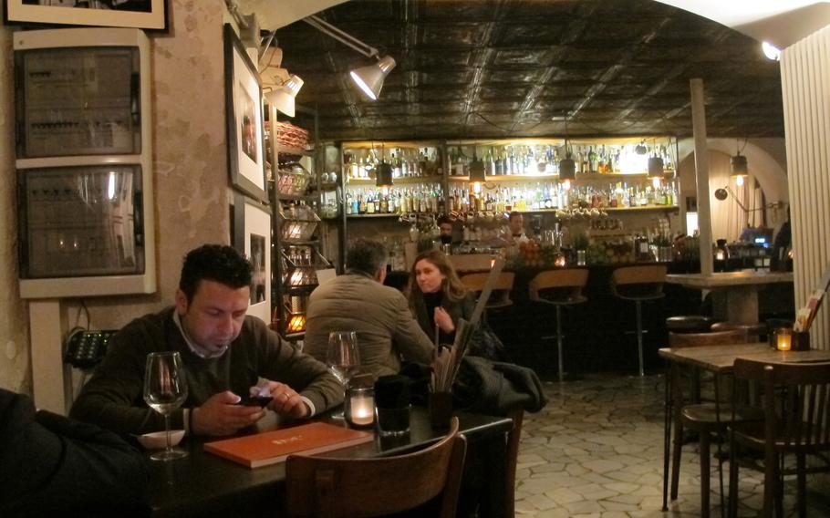Bar Borsa's inside ambience is a mix of romantic lighting, loud music and spartan furniture.