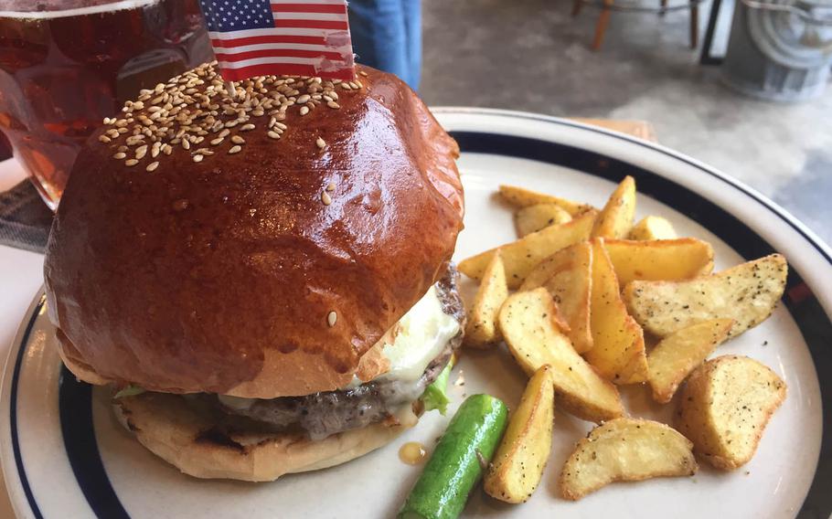 The Great Burger, a popular restaurant in Tokyo's fashionable Harajuku neighborhood, offers a variety of large, American-style burgers. The burger-of-the-month selection for April featured asparagus and two cheeses: Camembert and mozzarella.