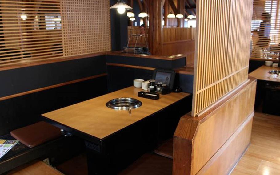 At Yakiniku King, you must remove your shoes and place them in a locker after entering the restaurant. You'll be seated on the floor in comfortable booth-like seats with space below for your legs.