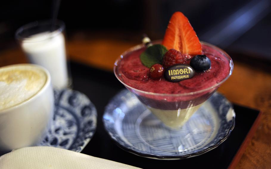 The Cassis Love Dessert, a raspberry and vanilla mousse, is one of many attractive sweets available at Iimori Patisserie in Frankfurt, Germany. The cafe is a short walk from the Frankfurt Cathedral and department stores.