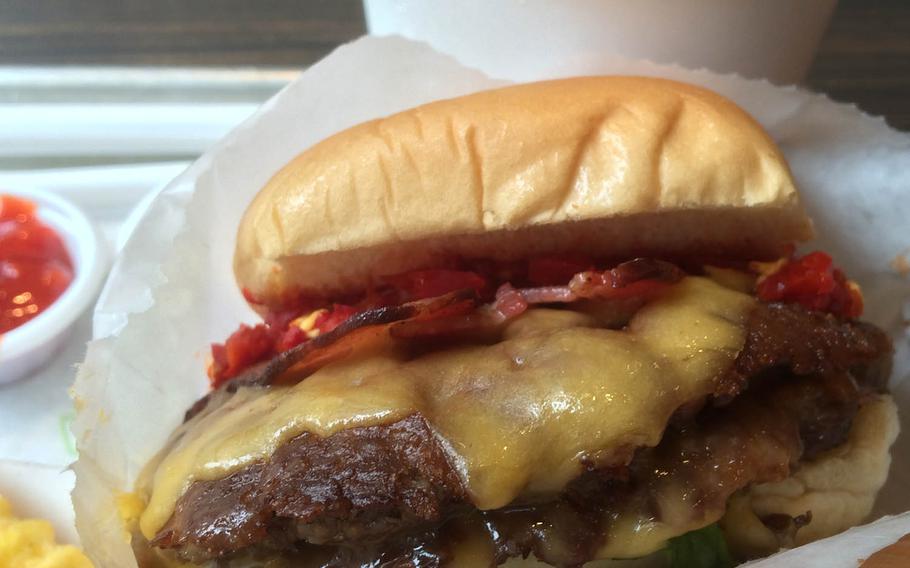 The SmokeShack burger comes with two patties, peppers and applewood-smoked bacon at Shake Shack's newest Tokyo location.