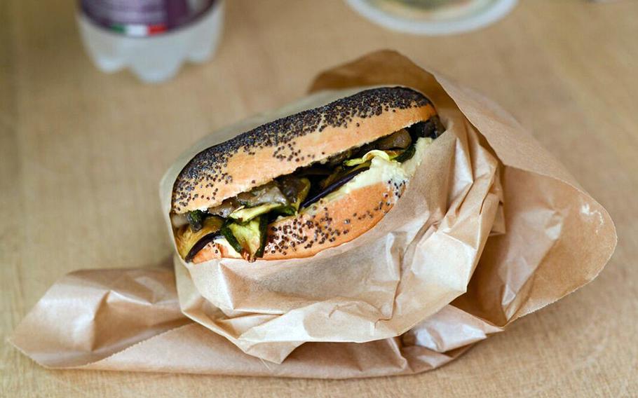 A bagel sandwich with zucchini and hummus at Hoop Bagel and Salad in Naples, Italy.