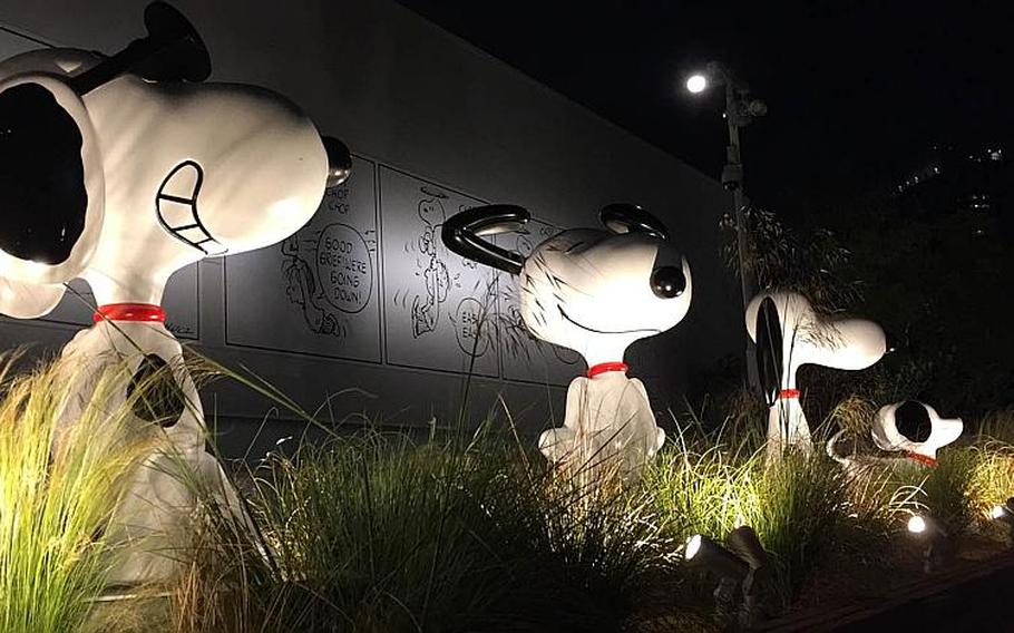 Snoopy statues decorate the entrance to the Snoopy Museum Tokyo, a temporary museum in Roppongi that will host revoling "Peanuts" exhibits over the next two and a half years.