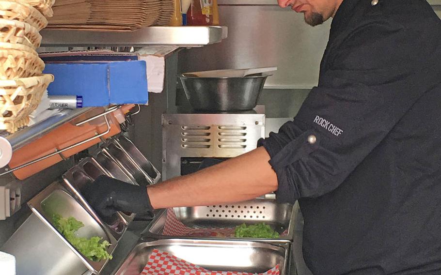Manuel Wittmann preps some fresh toppings for the lunch rush at Mama's Fresh Streetfood Co.