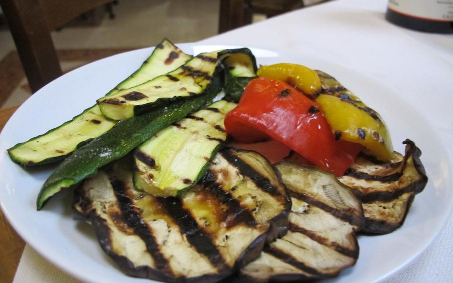 Grilled zucchini, eggplant and peppers,  both healthful and colorful, is one of the side dishes offered at Malvasia restaurant in Vicenza, Italy.