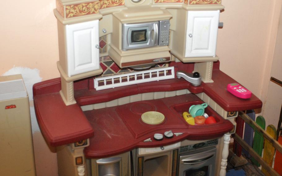 This is the first stove that Stella Greco "cooked" on when she was young. It's currently in a small room in her restaurant, Trattoria Pizzeria Stella, set up as a playground for kids.