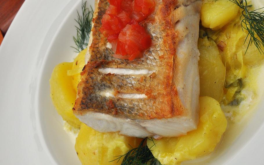 A fried filet of zander, or pike perch, a white fish popular in Europe, served over roasted potatoes with sprigs of dill was one of the daily lunch specials recently at the Proviantamt in Mainz, Germany. The restaurant offers fresh, seasonal cuisine and is a wine-lover's dream.