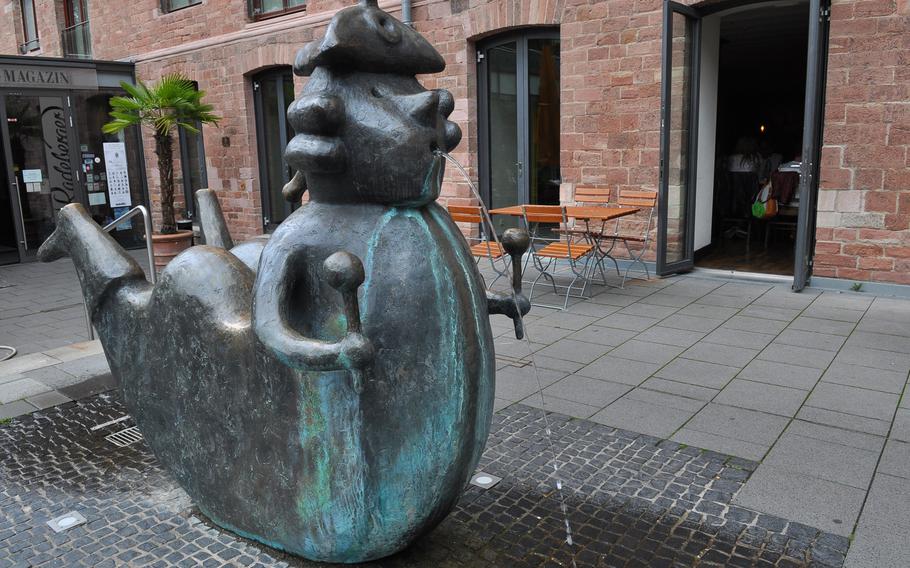 A quirky fountain sits outside the Proviantamt restaurant in Mainz, Germany.