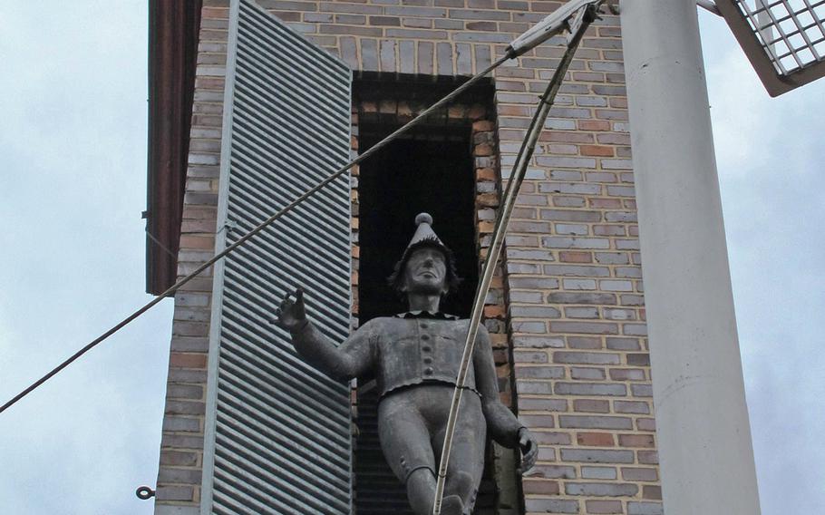 The Bajasseum in Enkenbach-Alsenborn, Germany, is well-known for this statue of a funambulist, or tightrope walker, stepping out of the tower onto a wire.