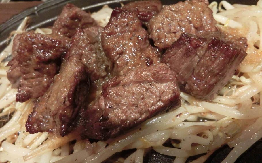 Sliced steak served on a sizzling hot plate is the most popular item for foreign customers at Hohryoh near Misawa Air Base, Japan.