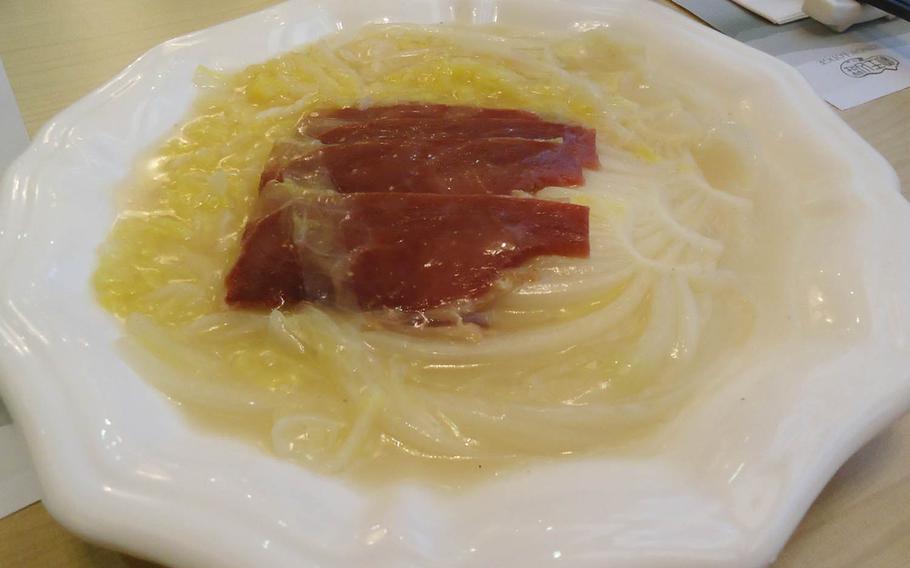 Kings' Lodge's braised Tianjin cabbage with Yunnan ham was salty and robust in flavor.
