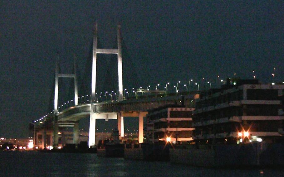 Travelling along one of the Yokohama Bay Bridge's12 lanes, high above ships transiting the water below, it's easy to imagine staring into Godzilla's eyes as he stomps through the ocean to wreak havoc in nearby Tokyo.