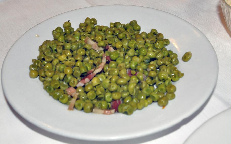 There were two side dish options during a recent visit to Trattoria da Marisa e Bruno in Forcate di Fontanafredda, Italy: this plate of peas seasoned with bacon and a mixed salad.