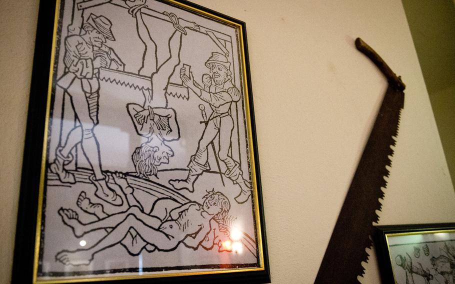 A print in the torture museum illustrates a 15th-century "death by sawing".