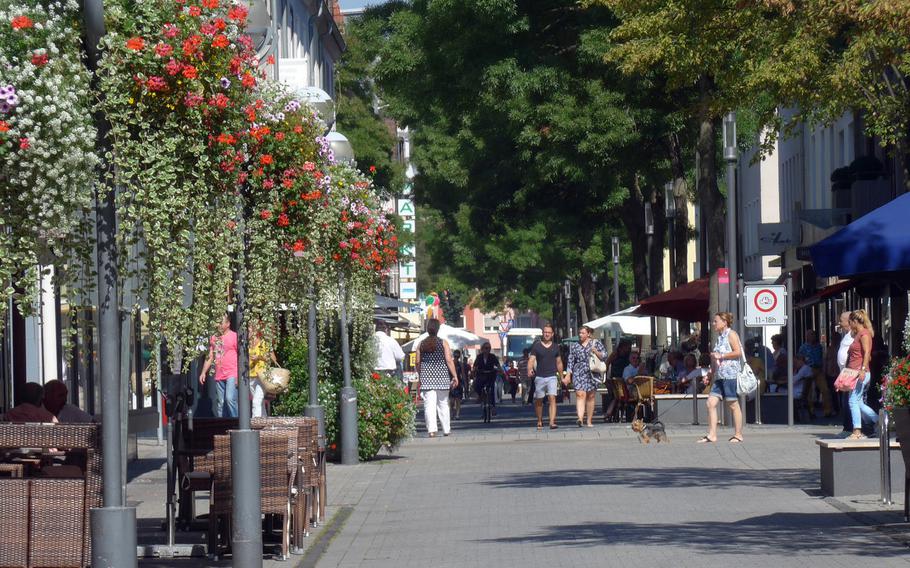 The streets of downtown Hanau, Germany, are colorfully decorated with flowers.
