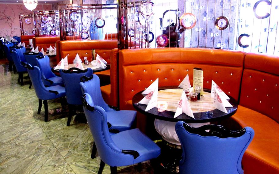 Gourmet Tempel in Kaiserslautern, Germany, features dozens of tables and booths in a sprawling dining room.