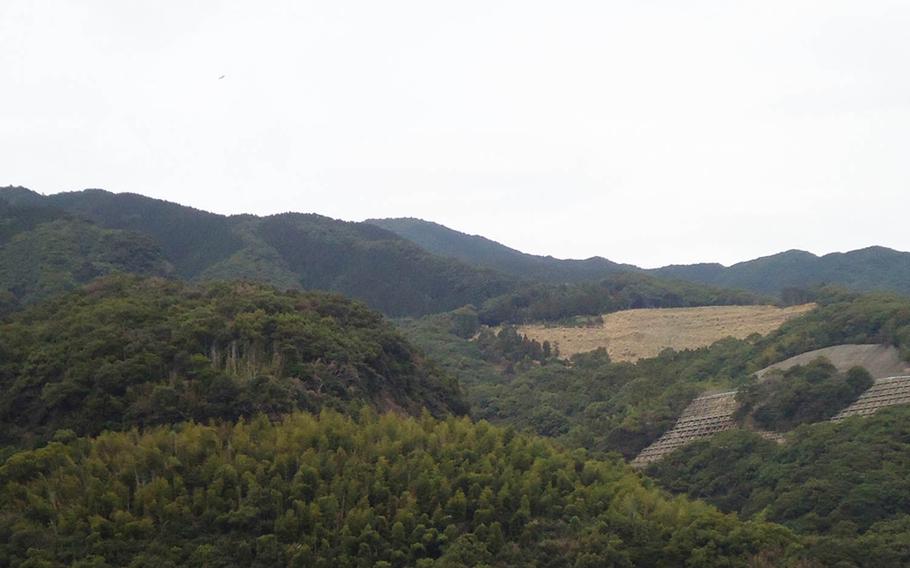Mount Sashiki, site of the plane crash that claimed the lives of 13 American airmen who perished delivering lifesaving food and relief supplies to emaciated prisoners from Fukuoka Prisoner of War Camp No. 2 in Nagasaki, Japan, at the tail end of World War II. The crash site was immediately left of the clearing, according to eye witnesses interviewed by Stars and Stripes.