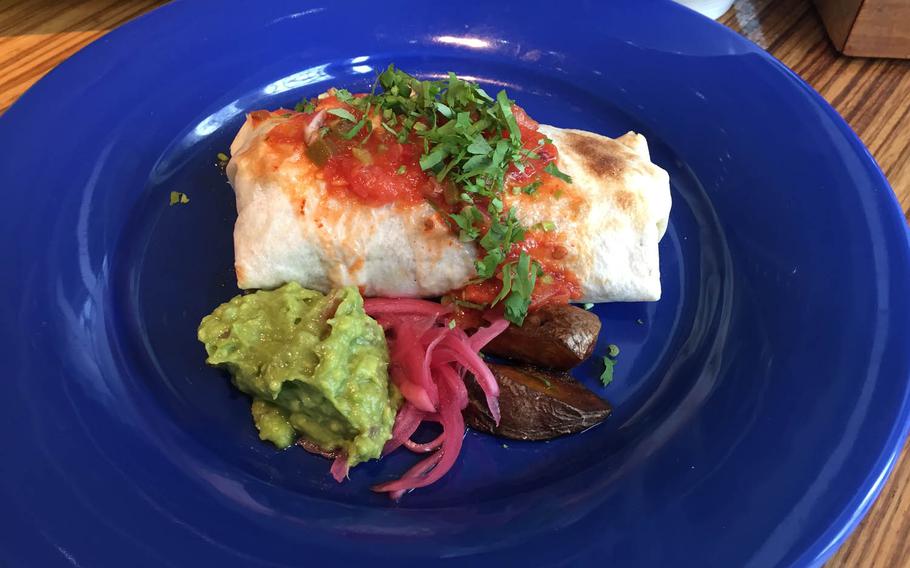 The chorizo and corn burrito at Mucho. Soup and salad that come with the 1,000-yen lunch set make the small portions easier to swallow.