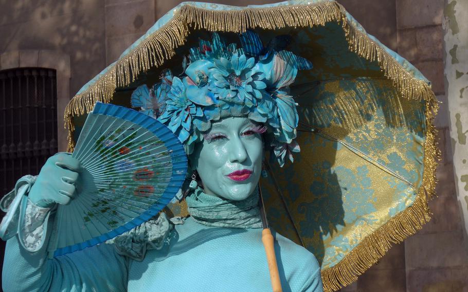 One of the human statues on Las Ramblas in Barcelona, Spain. The pedestrian area is known for its street artists. Here the statues seem to be livlier than they are in other cities.