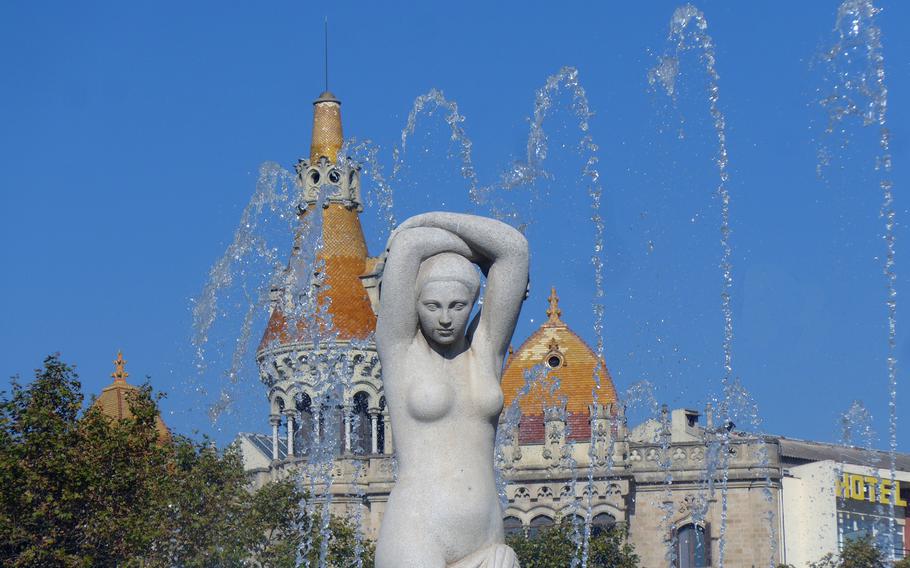 One of the many statues and fountains on the Placa de Catalunya, at the top end of Las Ramblas, in Barcelona, Spain.