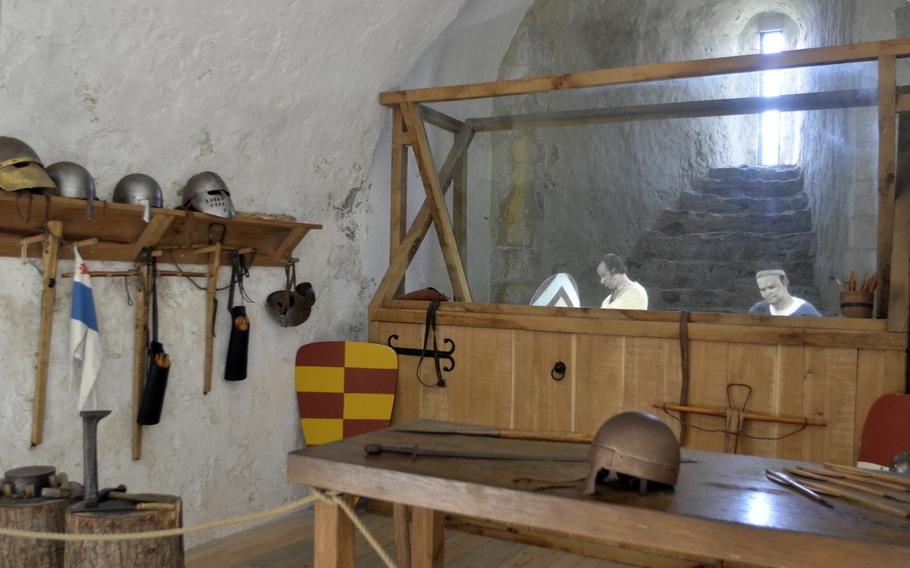 A recreated scene of a blacksmithworkshop inside the central great tower at Dover Castle in Kent, England. Medieval replications also include a kitchen, noble dwellings and a throne room.
