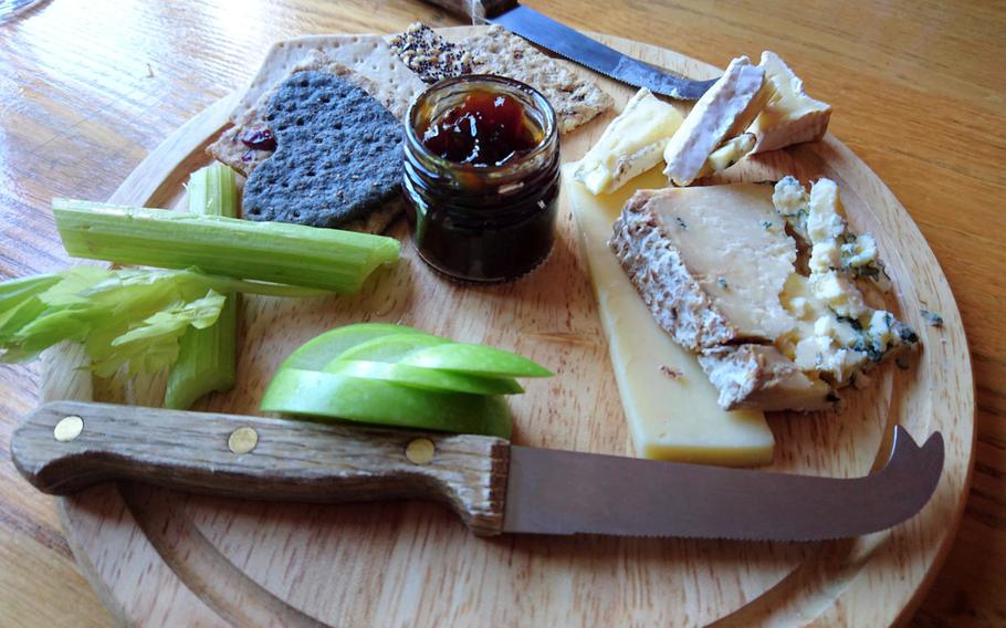 An English cheeseboard appetizer at The Old Cannon Brewery. One of two breweries in Bury St. Edmunds, The Old Cannon is a genuinely independent free house and one of the only pubs in Suffolk where you can watch beer being brewed on site.