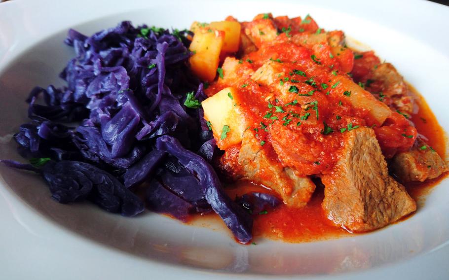 A pork and chorizo stew made with Old Cannon ale and a side of braised red cabbage at The Old Cannon Brewery.