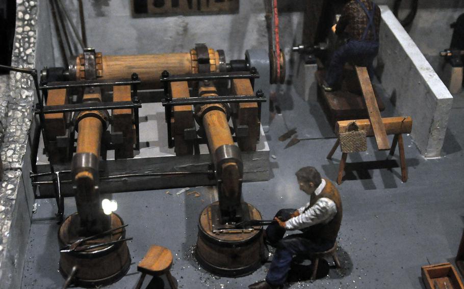 A display featuring miniature figures using equipment to make knives the way they were produced in the 15th Century is one of the first things for visitors to the Museo dell'Arte Fabbrile d delle Coltellerie in Maniago, Italy.