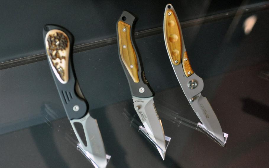 Modern folding knives are on display at the Museo dell'arte fabbrile e delle coltellerie in Manago, Italy, a city famous for producing knives and other steel instruments for almost 700 years.