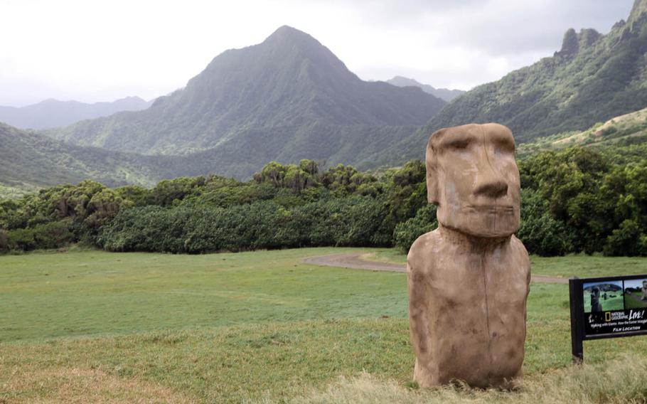 This replica of an Easter Island moai was used to film a National Geographic documentary explaining how the massive stone figures were possibly moved on land. Behind the figure is Kualoa's most iconic mountain peak, seen in numerous films and TV shows that have used the Hawaiian valley for filming.