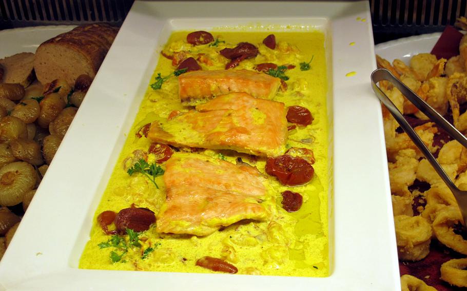Baked salmon in saffron sauce is often available at Il Ceppo on Fridays, along with a variety of other fishes and seafood, in a nod to Catholic Church tradition.