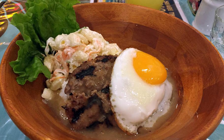 Loco Moco from Halenohea Hawaiian Caf?? and Diner at Hawaii Town in Yokohama, Japan. The dish generally consists of white rice topped with a hamburger patty, a fried egg and brown gravy.