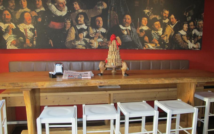 The small bar at al Ritrovo in Vicenza, Italy, features an aspirational image of conviviality.