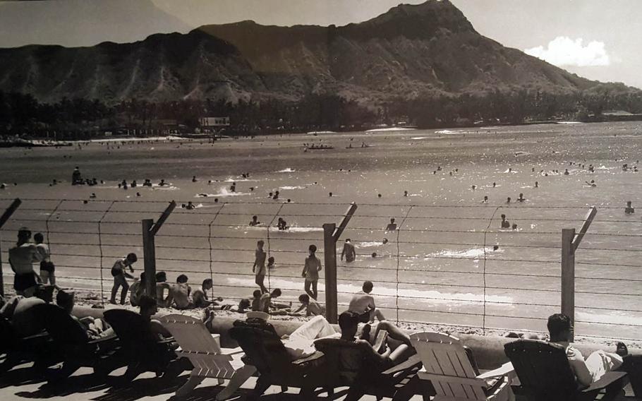 Waikiki Beach on Oahu, Hawaii, was fortified with a barbed-wire fence during World War II in the event of an invasion by the Japanese, as shown in this undated photo now on display at the Bishop Museum in Honolulu.