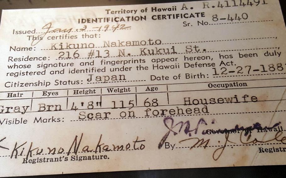 Martial law in Hawaii during World War II required everyone older than 6 to be fingerprinted and to carry at all times identification cards such as this one on display at the Bishop Museum.