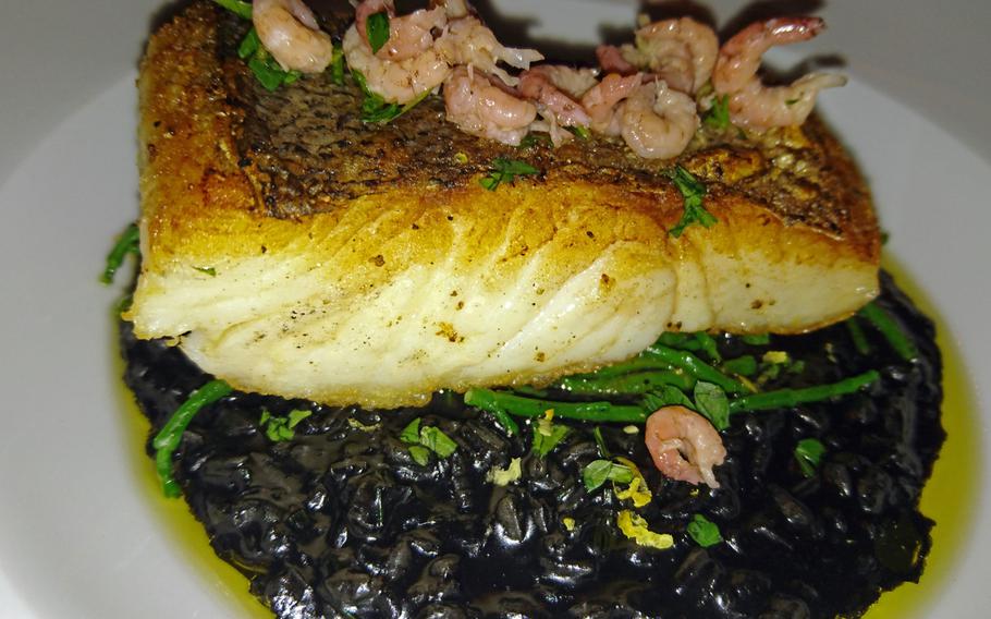 A hake fillet on risotto with ''gremolata,'' brown shrimps and samphire is one of the entrees served at the Pea Porridge restaurant in Bury St. Edmunds, England. Main dinner cost 12.95-21.95 pounds ($15.98-27.08).