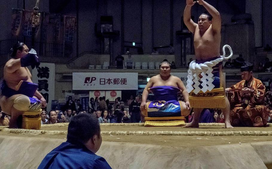 Yokozuna, the highest rank for a sumo, are identified by their white, braided-rope aprons.