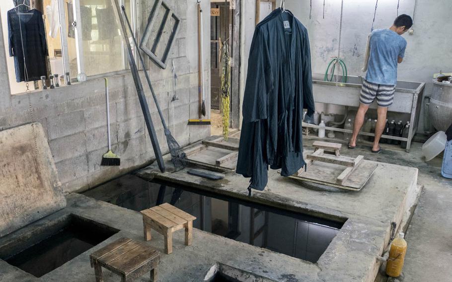 The dyeing bin Ai Kaze's indigo dyeing factory on Okinawa is nearly 5 feet deep.