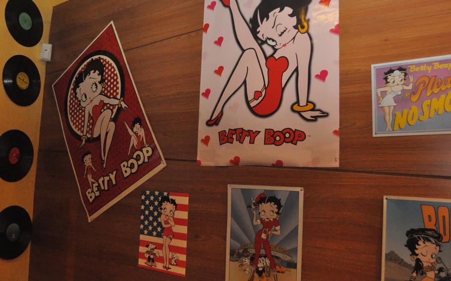 Rico's, in Pordenone, Italy,  features an array of memorabilia on the walls from the United States or Great Britain. With its main focus on the 1950s and 1960s, a lot of it could predate the customers who might choose to dine there.